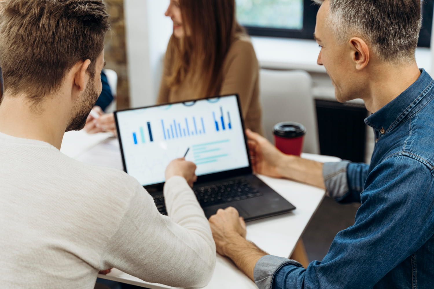 marketing team looking at ppc statistics